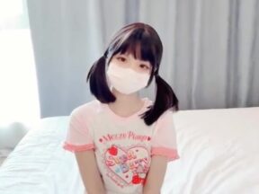 A young girl with lightly ponytailed hair, her pink and white vulva filled with passionate thrusting - Linlin, a junior student madou