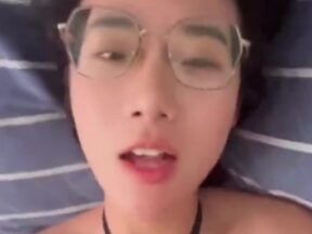 A primary school Chinese teacher, a bespectacled young woman, has been exposed for allegedly engaging in sexual activity, her appearance contrasting sharply with her wedding dress photos and explicit sex pictures. madou